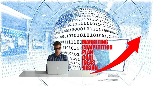 a man with his laptop planning for marketing goals